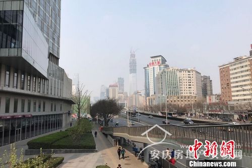 圖為北京雙井附近的寫字樓和居民住宅樓。 中新網(wǎng) 程春雨 攝